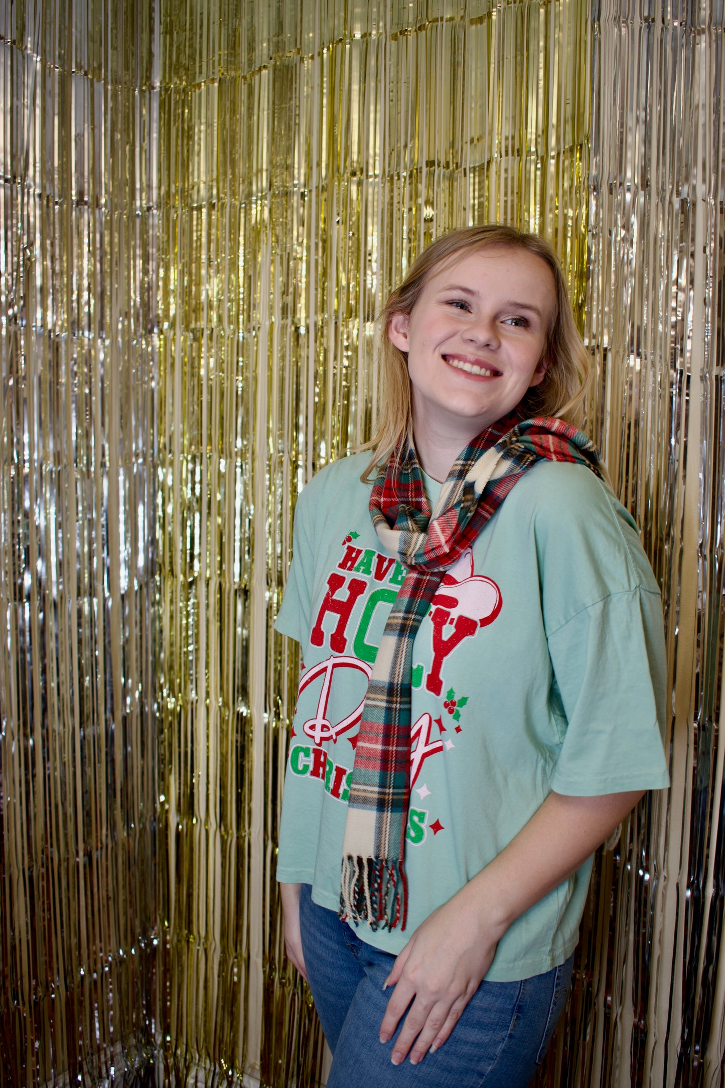 Model wearing red plaid scarf