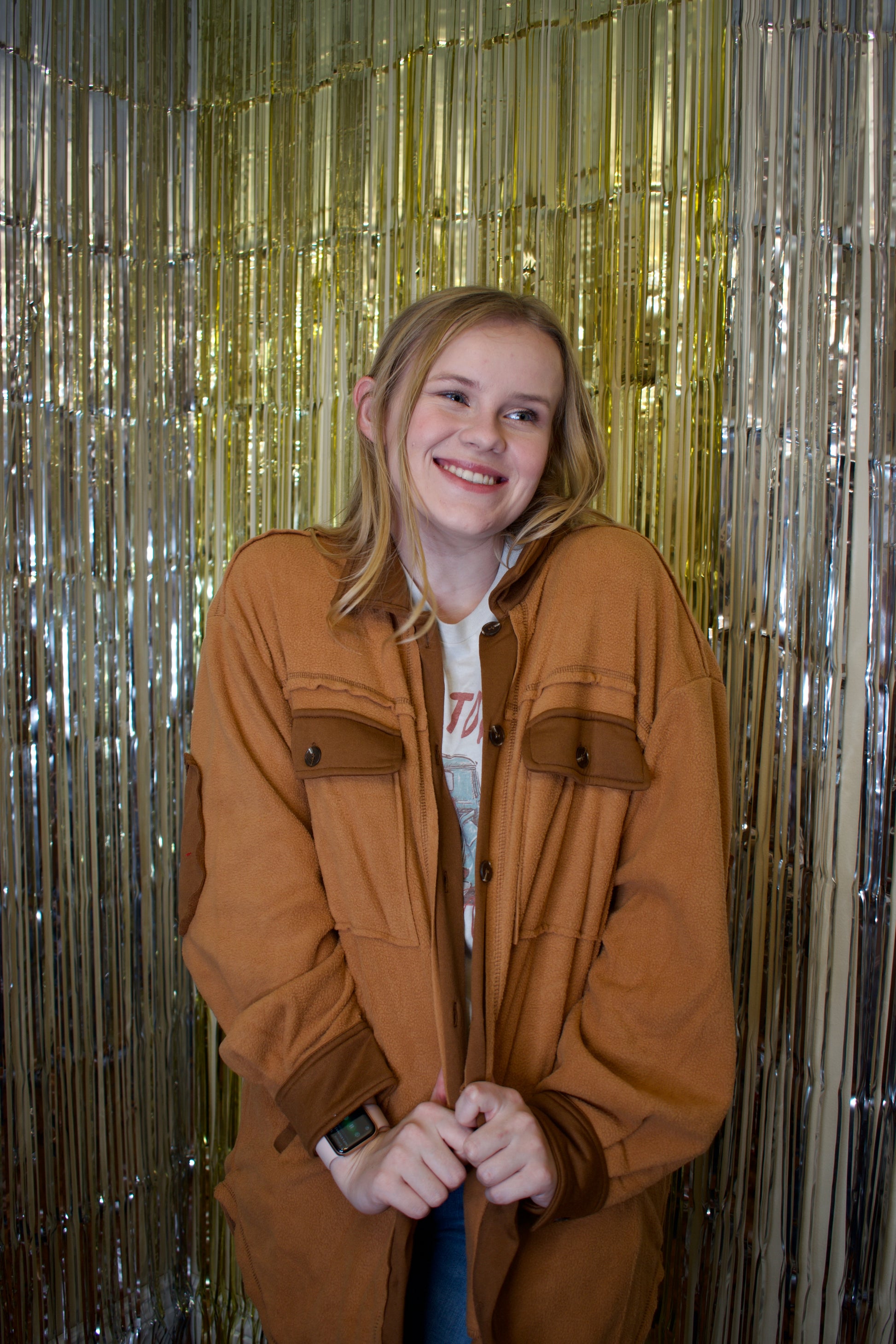 Model wearing a camel-colored, soft-textured shacket