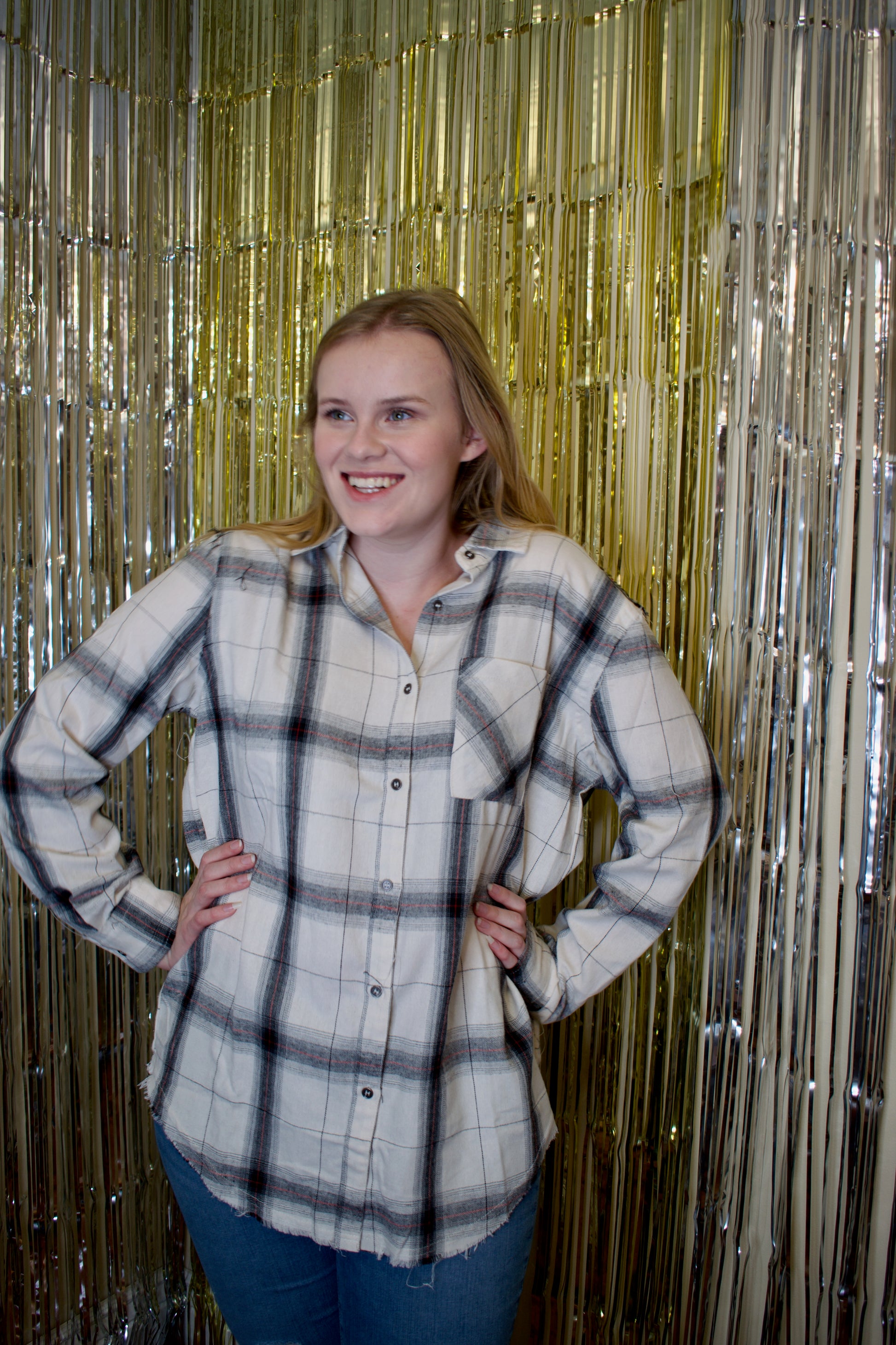 Model wearing a white flannel button down