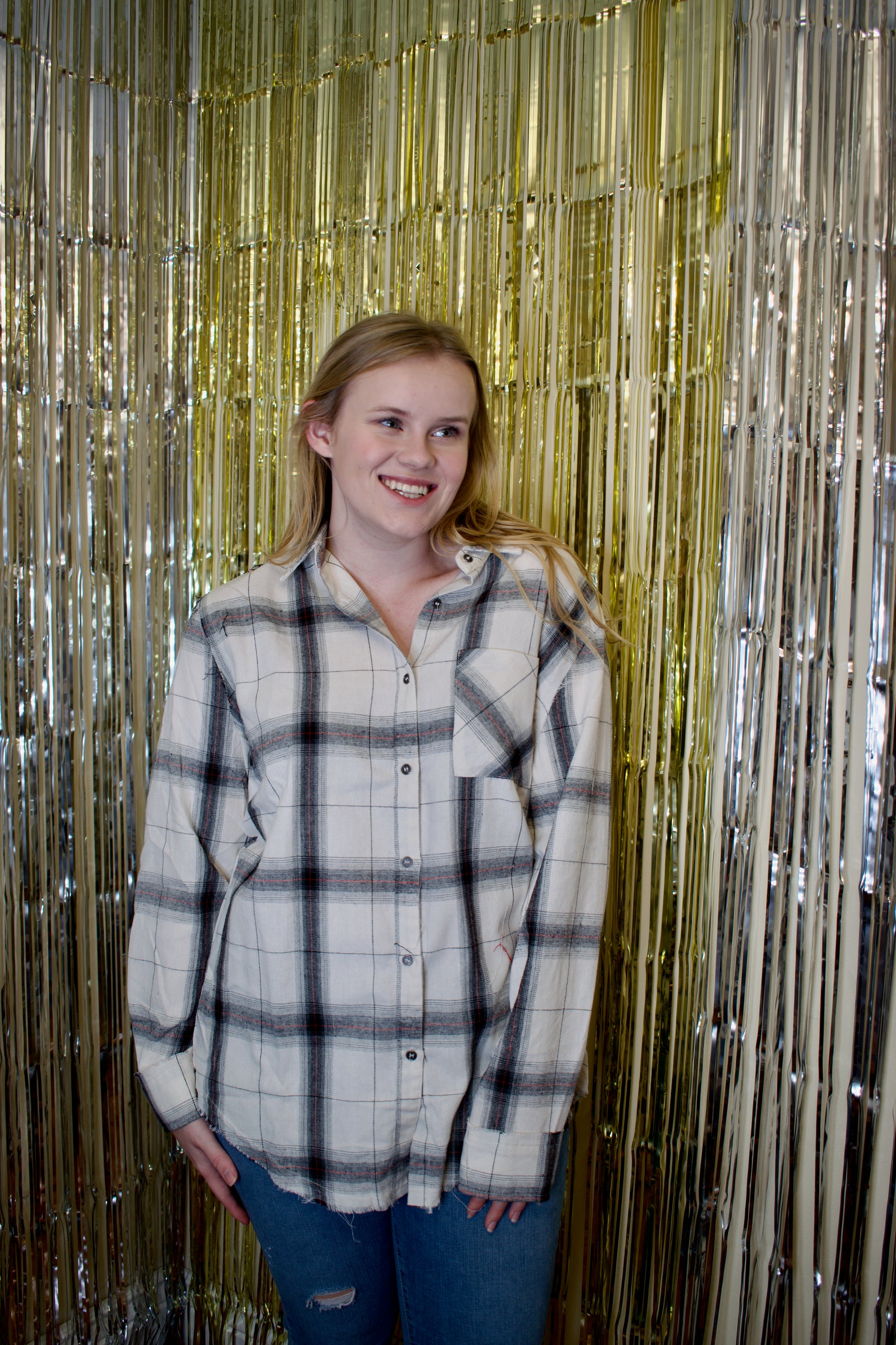 Model wearing a white flannel button down